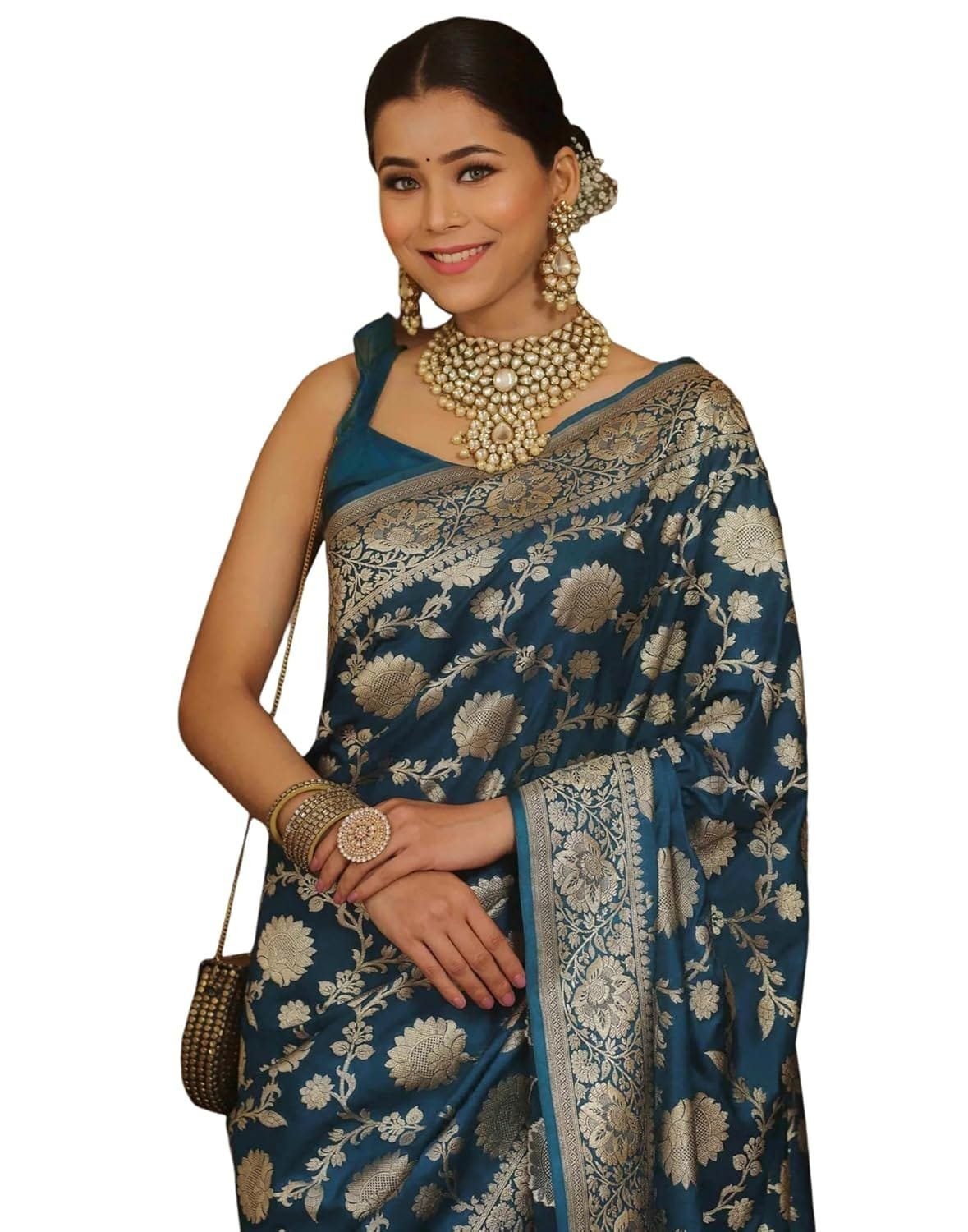 A woman wearing a floral dress, showcasing a colorful pattern with embellishments. She is standing confidently, highlighting the design and fit of her outfit.