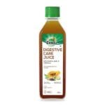 A bottle of Zandu Digestive Care Juice, featuring a label that mentions it contains papaya, bael, and triphala. The label indicates that it helps with digestion and highlights a quantity of 500.